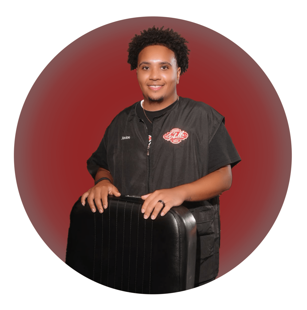 Xavion Moreno, Barber at Skillz Barbershop